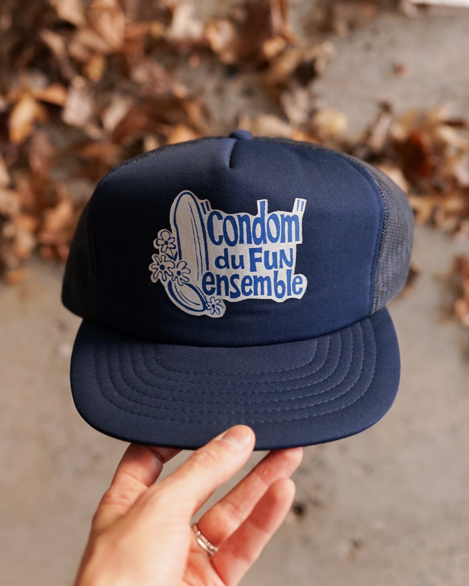 "condom du fun ensemble" trucker hat