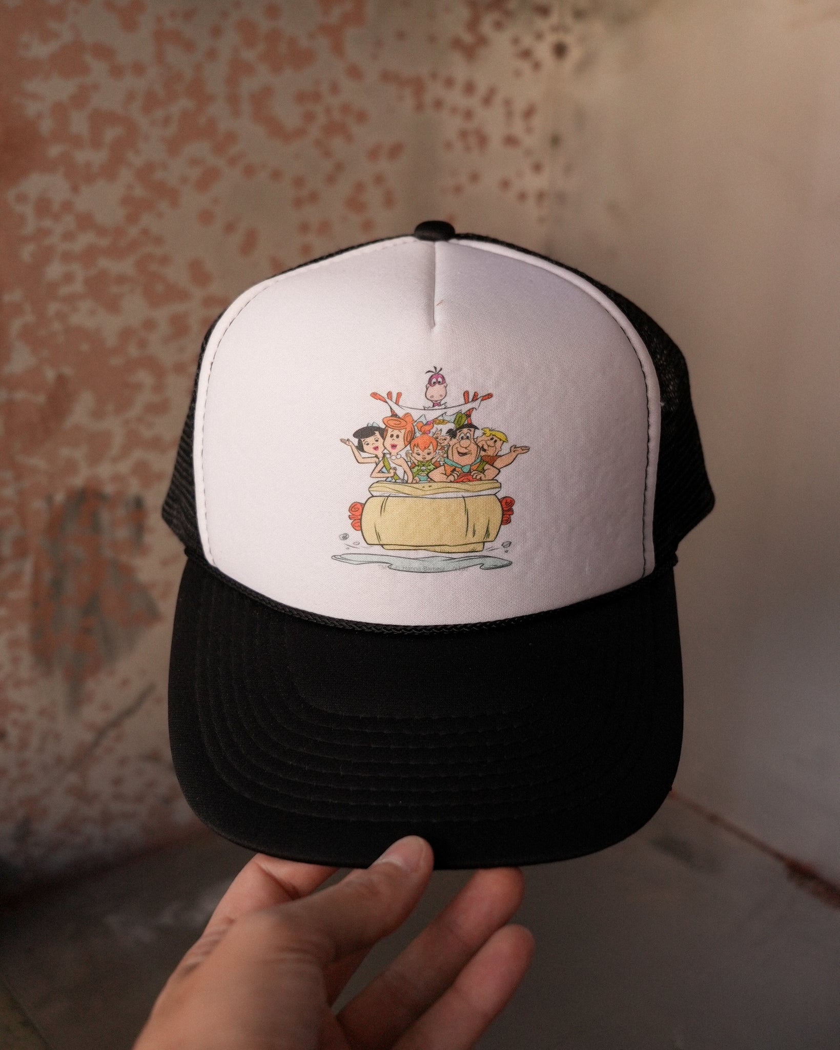 the flintstones trucker hat