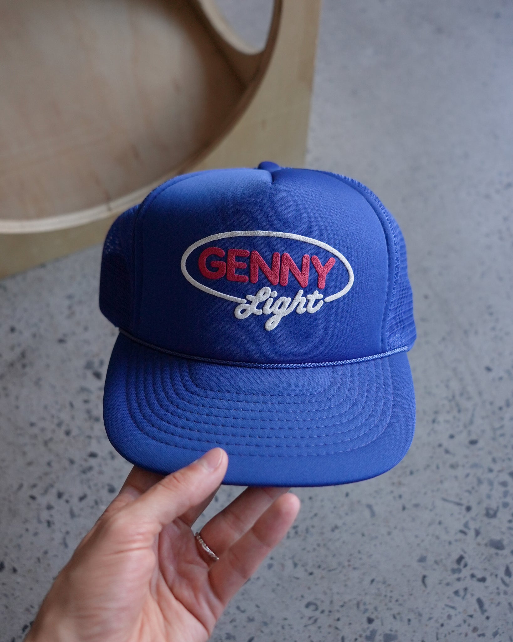 genny light trucker hat