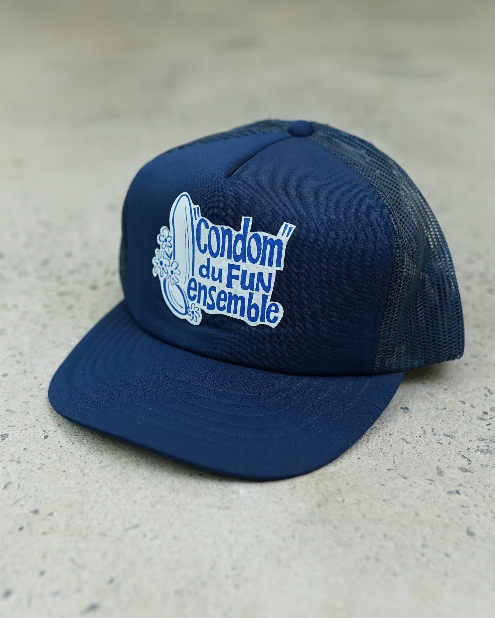 "condom du fun ensemble" trucker hat