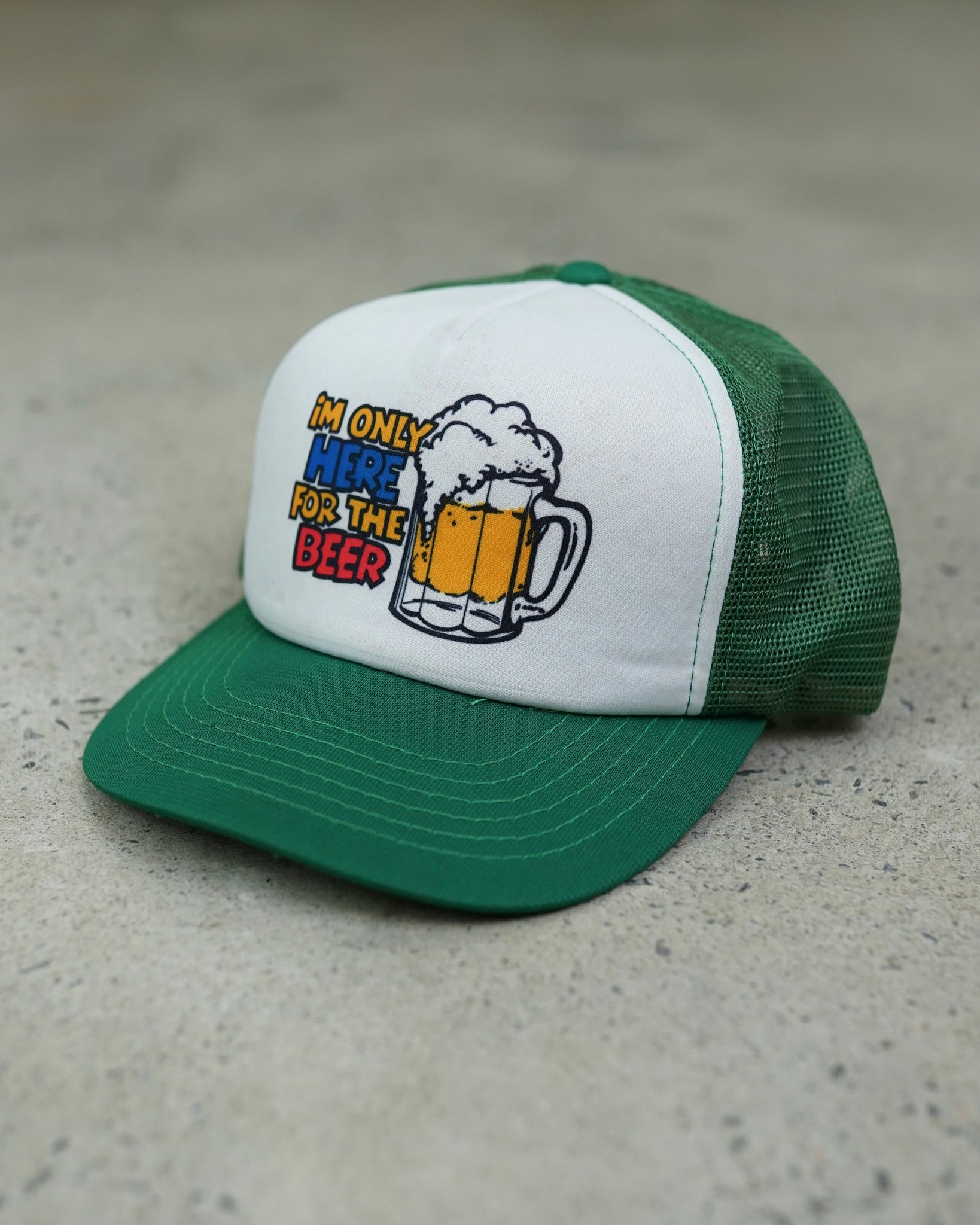 "im only here for the beer" trucker hat