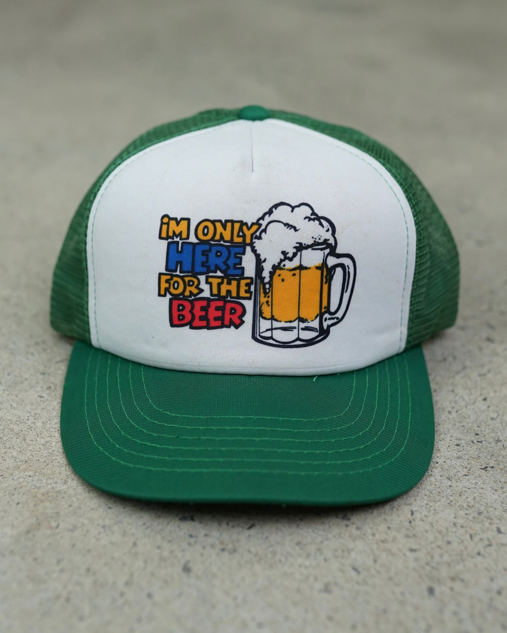 "im only here for the beer" trucker hat