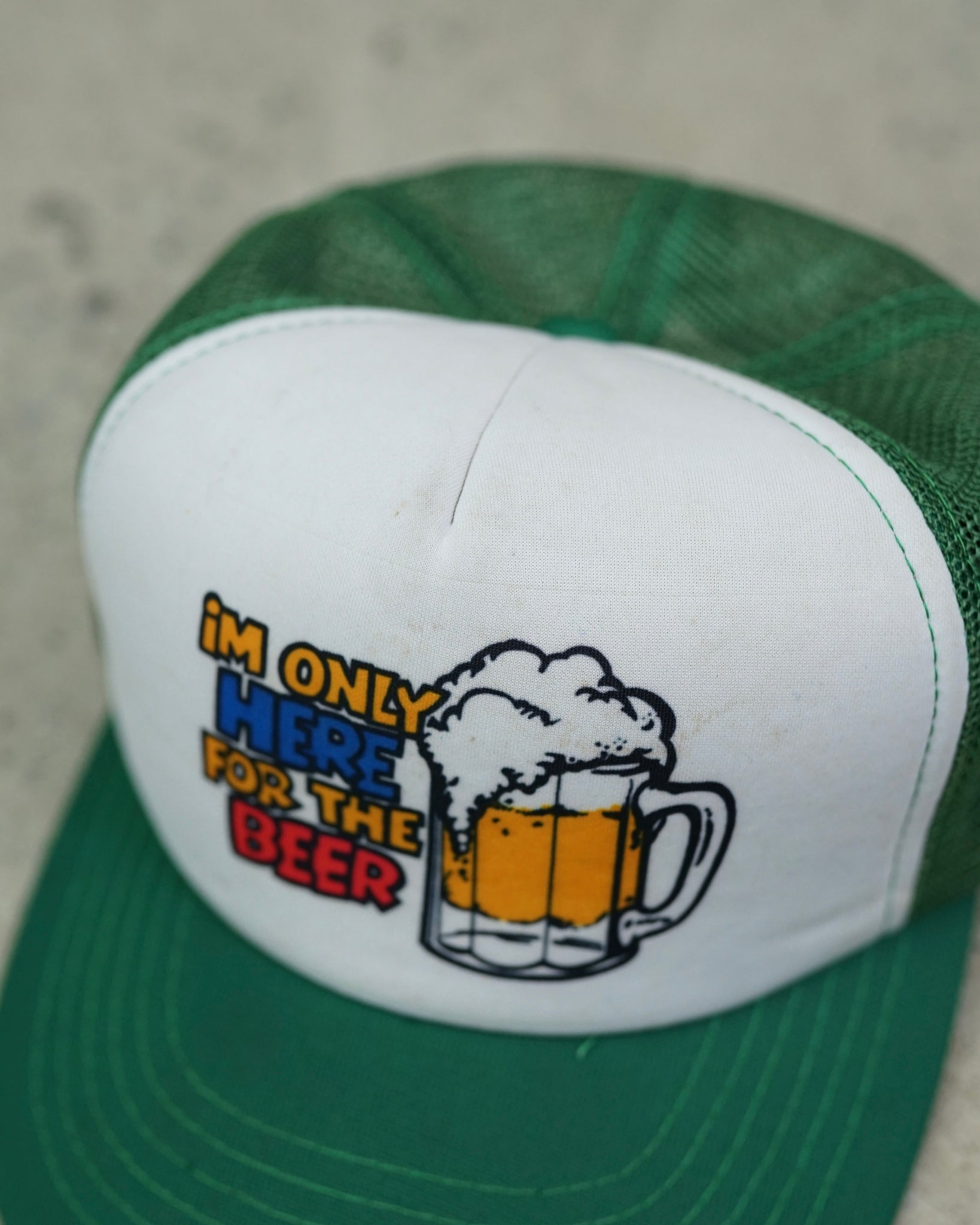 "im only here for the beer" trucker hat