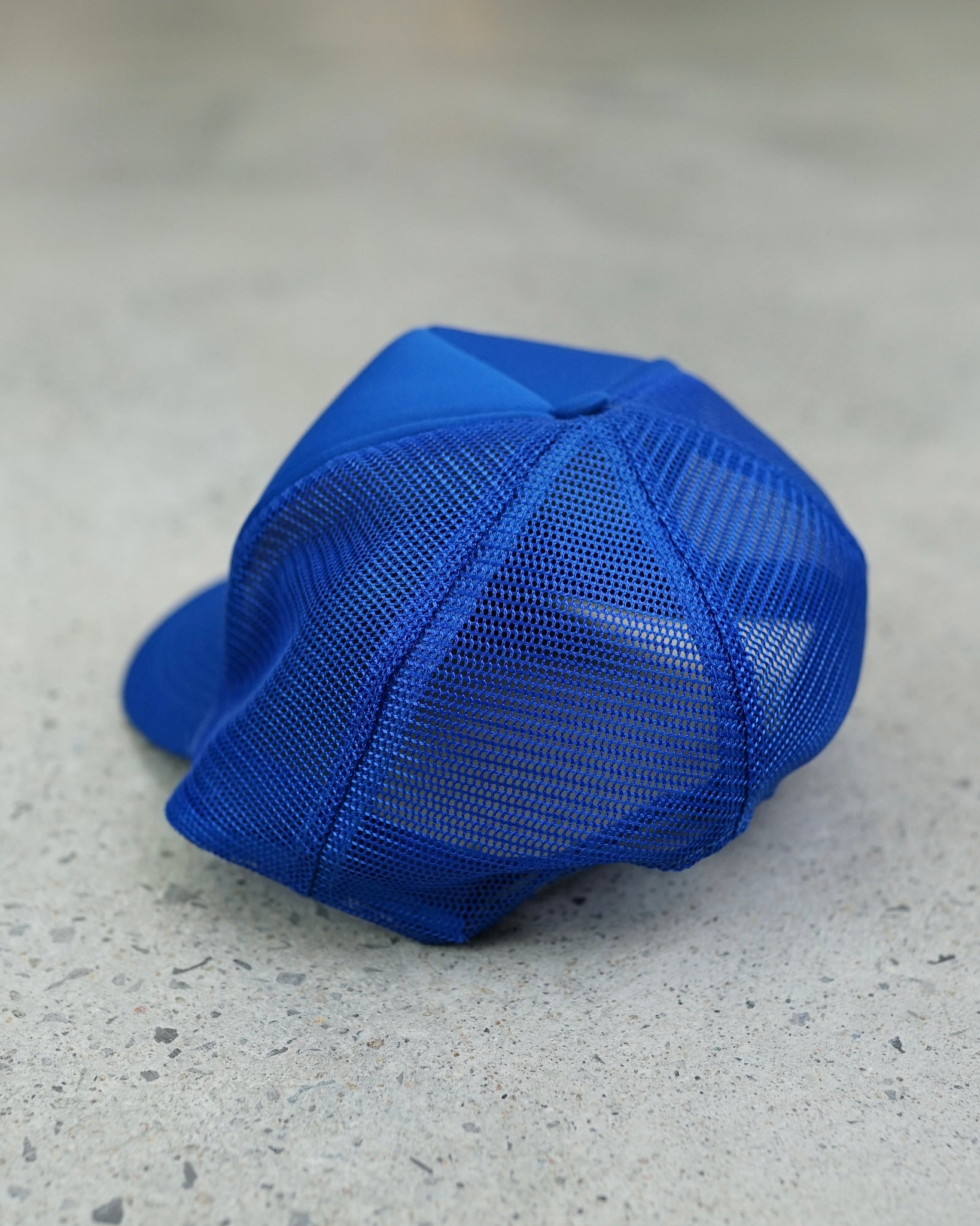 genny light trucker hat