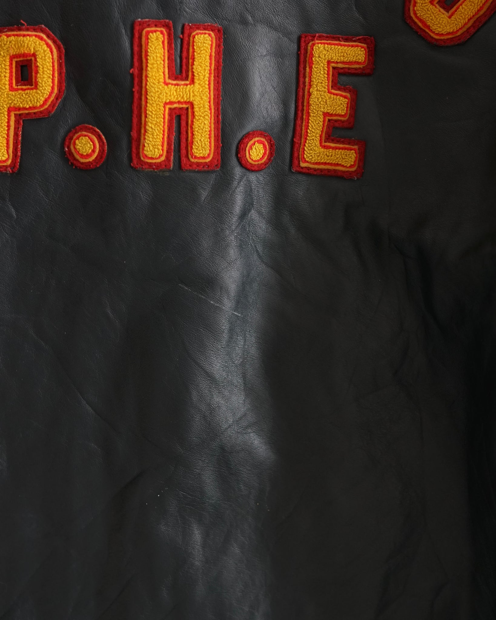 queen's p.h.e leather jacket