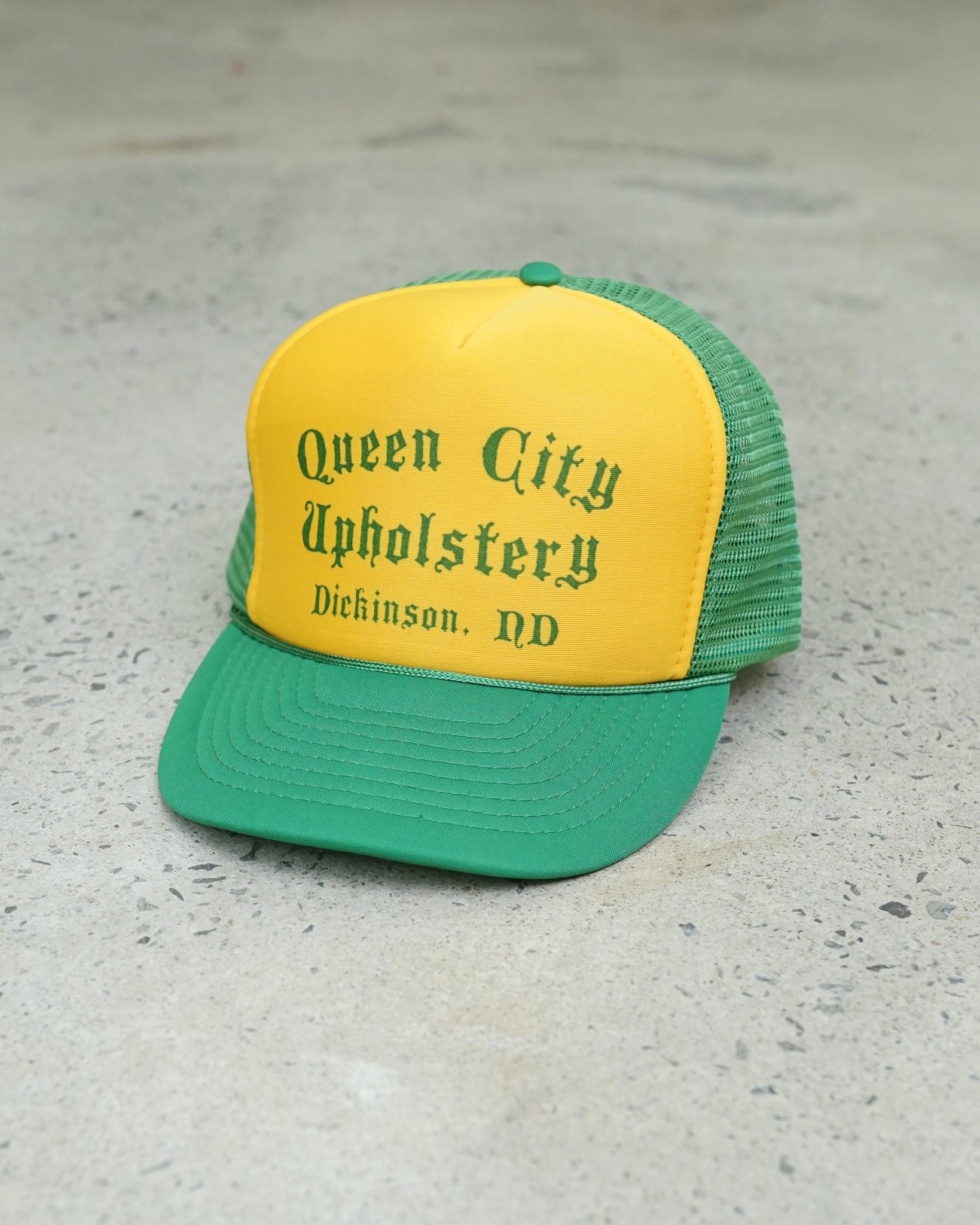 queen city upholstery trucker hat