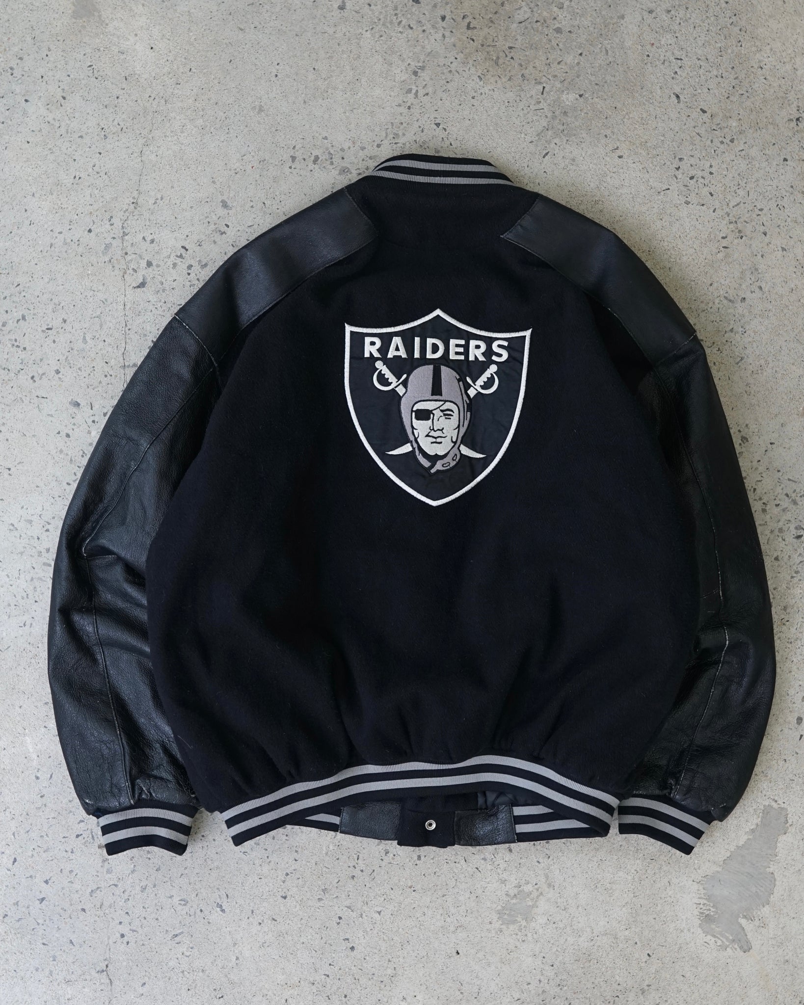 oakland raiders varsity jacket