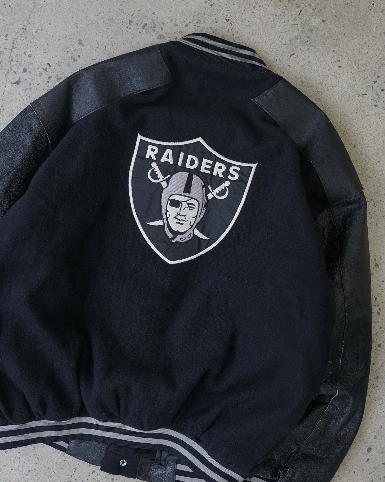 oakland raiders varsity jacket
