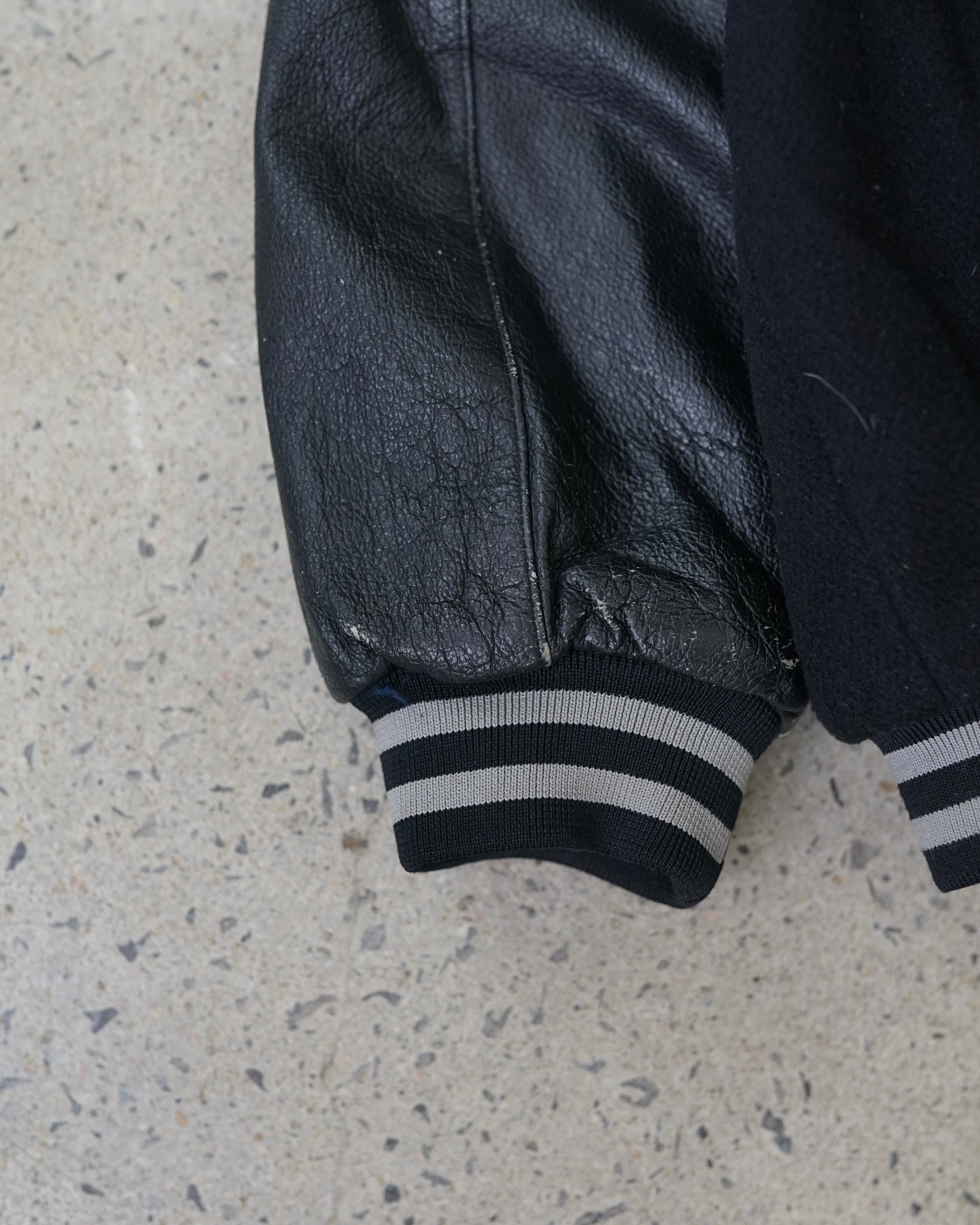 oakland raiders varsity jacket