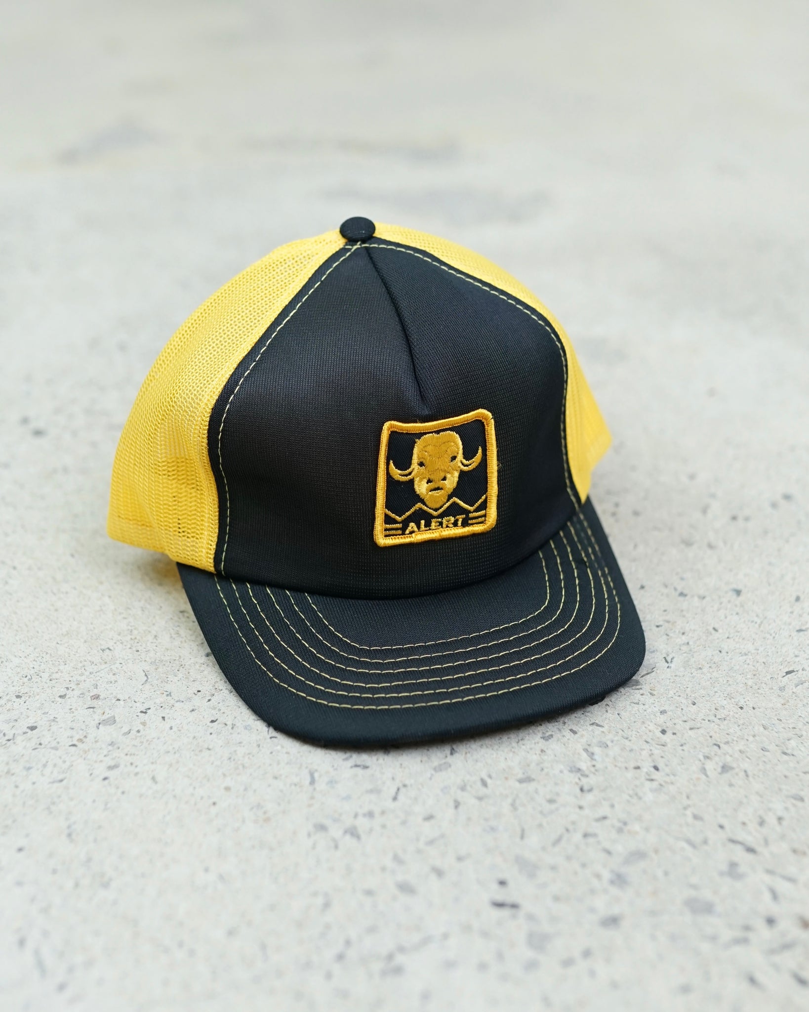 alert trucker hat